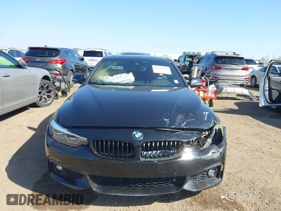 2019 BMW 4 Series 430i z VIN WBA4J1C56KBM13749, wystawiony jako IAAI lot #41849287 z przebiegiem 54 607 mil mil oraz . Historia ofert i sprzedaży dostępna na DreamBid. Obrazek 12.