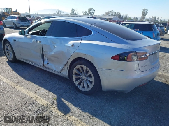 2017 Tesla Model S 60 with VIN 5YJSA1E12HF195741, listed as a IAAI auction lot 41861327 with 172,011 mi miles and . Bid and sale history available at DreamBid. Image 3.