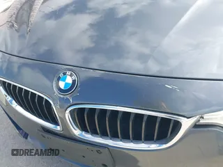 2016 BMW 4 Series 428i xDrive with VIN WBA4C9C56GG140427, listed as a IAAI auction lot 41886670 with 94,426 mi miles and . Bid and sale history available at carsss.com. Image 17.