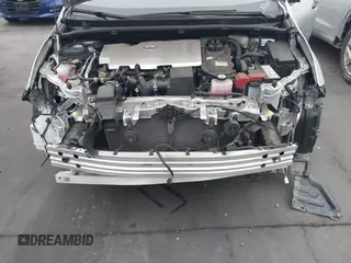 2022 Toyota Prius L Eco with VIN JTDKAMFU8N3164240, listed as a IAAI auction lot 41892462 with 35,980 mi miles and . Bid and sale history available at DreamBid. Image 6.