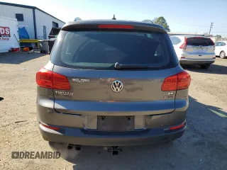 2016 Volkswagen Tiguan S with VIN WVGBV7AX0GW524346, listed as a Copart auction lot 87221564 with 163,609 mi miles and Salvage Title. Bid and sale history available at DreamBid. Image 6.