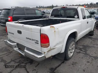 2003 Dodge Dakota SLT with VIN 1D7HL42N83S296040, listed as a IAAI auction lot 41462371 with 250,407 mi miles. Bid and sale history available at carsss.com. Image 6.