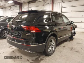 2021 Volkswagen Tiguan SE with VIN 3VV2B7AXXMM034880, listed as a IAAI auction lot 41979636 with 34,490 mi miles and . Bid and sale history available at DreamBid. Image 4.