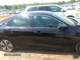 2016 Honda Civic EX-L z VIN 19XFC1F74GE041373, wystawiony jako IAAI lot #42201565 z przebiegiem 122 069 mil mil oraz . Historia ofert i sprzedaży dostępna na DreamBid. Obrazek 13.