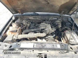 2001 Ford Ranger XL z VIN 1FTYR14U91PA04178, wystawiony jako Copart lot #57509025 z przebiegiem 188 269 mil mil oraz Czysty tytuł • Clean title. Historia ofert i sprzedaży dostępna na DreamBid. Obrazek 11.