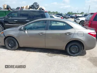 2018 Toyota Corolla L z VIN 5YFBURHE1JP855556, wystawiony jako IAAI lot #42273685 z przebiegiem 165 792 mil mil oraz . Historia ofert i sprzedaży dostępna na DreamBid. Obrazek 14.