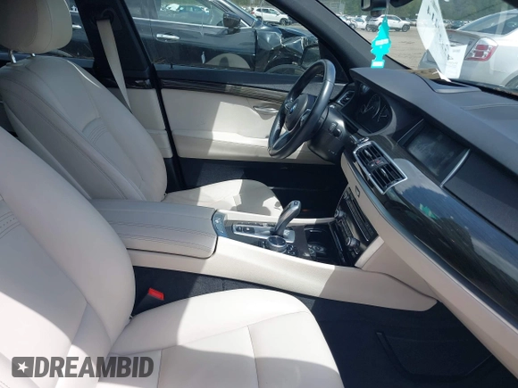 2014 BMW 5 Series 535i Gran Turismo xDrive with VIN WBA5M4C52ED183844, listed as a IAAI auction lot 42227214 with 104,098 mi miles and . Bid and sale history available at DreamBid. Image 5.