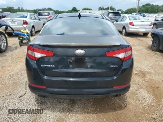 2013 Kia Optima SX z VIN 5XXGR4A65DG215196, wystawiony jako Copart lot #60927695 z przebiegiem 73 164 mil mil oraz Czysty tytuł • Clean title. Historia ofert i sprzedaży dostępna na DreamBid. Obrazek 7.