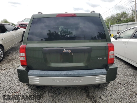 2009 Jeep Patriot Limited with VIN 1J4FT48B79D120490, listed as a Copart auction lot 55071885 with 173,311 mi miles and Salvage title. Bid and sale history available at DreamBid. Image 6.
