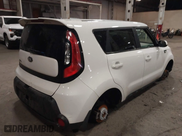 2014 Kia Soul with VIN KNDJN2A24E7089670, listed as a IAAI auction lot 38680967 with 63,504 mi miles. Bid and sale history available at carsss.com. Image 4.