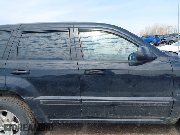 2008 Jeep Grand Cherokee Laredo with VIN 1J8GR48K48C119836, listed as a IAAI auction lot 42114083 with 129,352 mi miles. Bid and sale history available at carsss.com. Image 13.