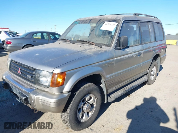 1997 Mitsubishi Montero z VIN JA4MR41R3VJ006477, wystawiony jako IAAI lot #41326277 z przebiegiem 239 378 mil mil oraz . Historia ofert i sprzedaży dostępna na DreamBid. Obrazek 2.