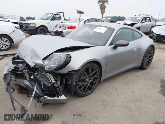 2023 Porsche 911 Carrera with VIN WP0AA2A93PS206048, listed as a IAAI auction lot 42022225 with 6,439 mi miles and . Bid and sale history available at DreamBid. Image 2.