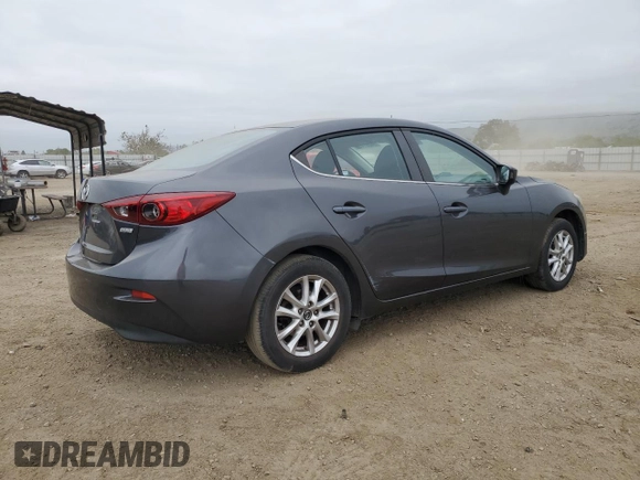 2016 Mazda 3 i Sport with VIN JM1BM1U74G1285879, listed as a Copart auction lot 54601455 with 67,136 mi miles and Salvage Title. Bid and sale history available at DreamBid. Image 3.