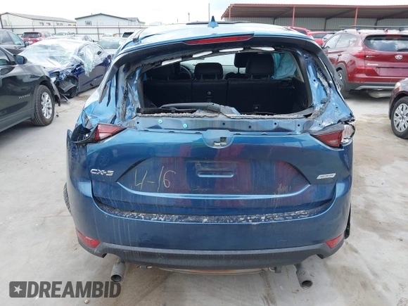 2018 Mazda CX-5 Touring z VIN JM3KFACM5J1442416, wystawiony jako IAAI lot #42093137 z przebiegiem 65 102 mil mil oraz . Historia ofert i sprzedaży dostępna na DreamBid. Obrazek 17.