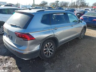 2020 Volkswagen Tiguan SE with VIN 3VV2B7AX4LM081188, listed as a IAAI auction lot 41655478 with 63,593 mi miles. Bid and sale history available at carsss.com. Image 4.
