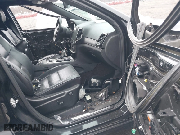 2019 Jeep Grand Cherokee High Altitude with VIN 1C4RJFCG9KC566594, listed as a IAAI auction lot 41128793 with 96,244 mi miles and . Bid and sale history available at DreamBid. Image 5.