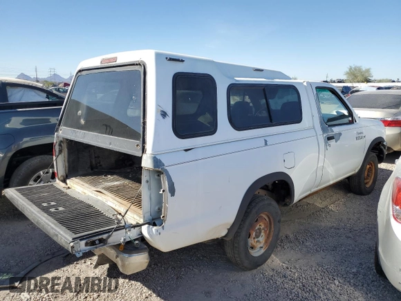 1998 Nissan Frontier XE with VIN 1N6DD21S9WC357098, listed as a Copart auction lot 77652604 with Not provided miles and Clean title. Bid and sale history available at DreamBid. Image 3.