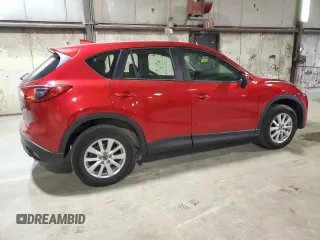 2016 Mazda CX-5 Sport z VIN JM3KE4BY9G0824021, wystawiony jako Copart lot #52392345 z przebiegiem 121 990 mil mil oraz Szkoda całkowita • Salvage title. Historia ofert i sprzedaży dostępna na DreamBid. Obrazek 3.