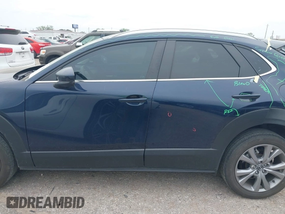 2023 Mazda CX-30 S Carbon Edition with VIN 3MVDMBCM1PM520066, listed as a IAAI auction lot 41877916 with 22,973 mi miles and . Bid and sale history available at carsss.com. Image 14.