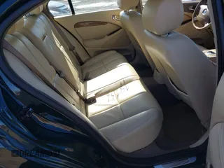 2005 Jaguar S-Type with VIN SAJWA01T95FN51551, listed as a IAAI auction lot 41637854 with 90,075 mi miles and . Bid and sale history available at DreamBid. Image 8.