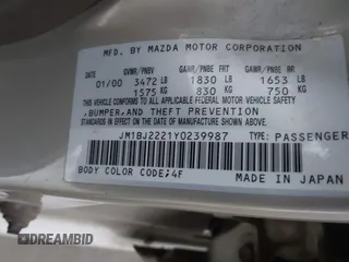 2000 Mazda Protege DX with VIN JM1BJ2221Y0239987, listed as a IAAI auction lot 42092488 with 140,756 mi miles and . Bid and sale history available at DreamBid. Image 9.