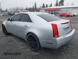 2009 Cadillac CTS RWD w/1SA with VIN 1G6DF577890171787, listed as a IAAI auction lot 41883724 with 146,251 mi miles. Bid and sale history available at carsss.com. Image 3.