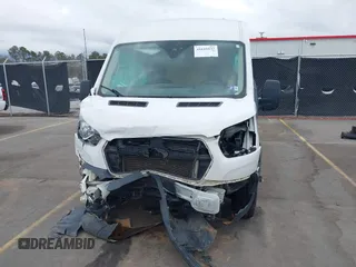 2021 Ford Transit Cargo with VIN 1FTBR1C85MKA12810, listed as a IAAI auction lot 41610132 with 105,724 mi miles and . Bid and sale history available at DreamBid. Image 12.