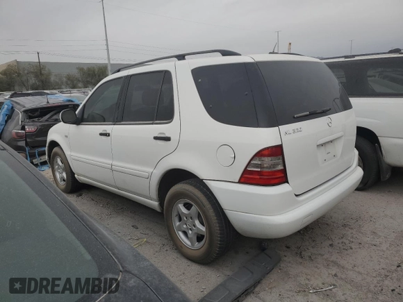 2000 Mercedes-Benz M-Class with VIN 4JGAB54E2YA170332, listed as a Copart auction lot 73206804 with 121,910 mi miles and Non Repairable. Bid and sale history available at carsss.com. Image 2.