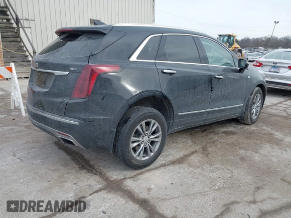 2021 Cadillac XT5 AWD Premium Luxury with VIN 1GYKNDRS7MZ168493, listed as a IAAI auction lot 41395162 with 33,064 mi miles. Bid and sale history available at carsss.com. Image 4.