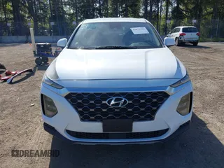 2019 Hyundai Santa Fe SE with VIN 5NMS2CAD0KH098259, listed as a IAAI auction lot 42075356 with 55,163 mi miles and . Bid and sale history available at DreamBid. Image 13.