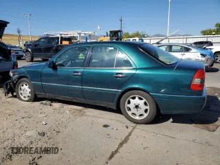 1997 Mercedes-Benz C with VIN WDBHA23EXVF507185, listed as a Copart auction lot 73716364 with 167,171 mi miles and Salvage title. Bid and sale history available at DreamBid. Image 2.