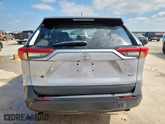 2021 Toyota RAV4 XLE Premium with VIN 2T3C1RFVXMC170581, listed as a Copart auction lot 58327005 with 54,200 mi miles and Salvage title. Bid and sale history available at DreamBid. Image 6.