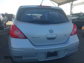 2009 Nissan Versa 1.8 SL with VIN 3N1BC13E29L406619, listed as a IAAI auction lot 41761728 with 115,510 mi miles. Bid and sale history available at carsss.com. Image 17.