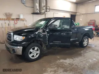 2013 Toyota Tundra 4WD Truck with VIN 5TFUW5F16DX305142, listed as a IAAI auction lot 41139364 with 212,390 mi miles. Bid and sale history available at carsss.com. Image 2.