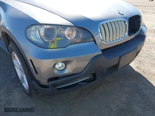 2007 BMW X5 3.0si with VIN 5UXFE43557L011481, listed as a IAAI auction lot 41764468 with 116,770 mi miles. Bid and sale history available at carsss.com. Image 6.