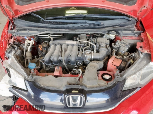 2015 Honda Fit EX-L z VIN 3HGGK5H88FM701702, wystawiony jako Copart lot #56390935 z przebiegiem 111 410 mil mil oraz Szkoda całkowita • Salvage title. Historia ofert i sprzedaży dostępna na DreamBid. Obrazek 11.