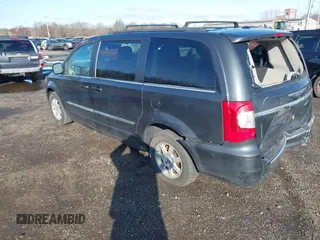 2012 Chrysler Town & Country Touring with VIN 2C4RC1BG8CR213738, listed as a IAAI auction lot 41912682 with 211,470 mi miles and . Bid and sale history available at DreamBid. Image 3.