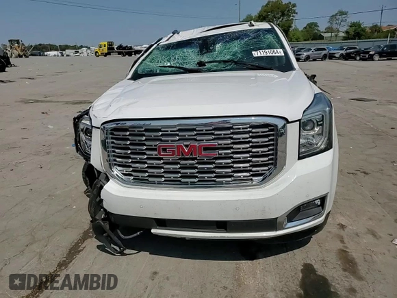 2019 GMC Yukon Denali with VIN 1GKS1CKJ7KR194428, listed as a Copart auction lot 71191064 with 56,409 mi miles and Salvage Title. Bid and sale history available at carsss.com. Image 15.