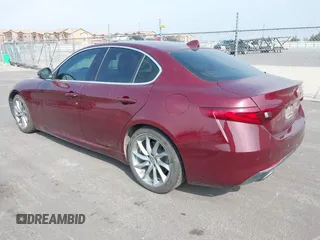 2018 Alfa Romeo Giulia with VIN ZARFAEBN8J7566581, listed as a IAAI auction lot 41524224 with 56,863 mi miles. Bid and sale history available at carsss.com. Image 3.