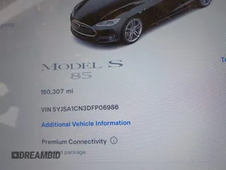 2013 Tesla Model S with VIN 5YJSA1CN3DFP06986, listed as a IAAI auction lot 41271801 with 150,307 mi miles and . Bid and sale history available at DreamBid. Image 15.