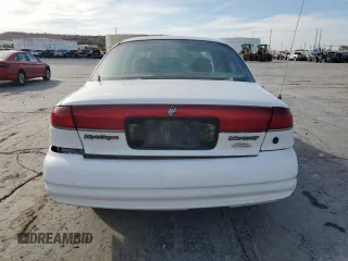 1999 Mercury Mystique GS z VIN 1MEFM653XXK629587, wystawiony jako Copart lot #78900204 z przebiegiem 139 060 mil mil oraz Szkody całkowita. Historia ofert i sprzedaży dostępna na DreamBid. Obrazek 6.