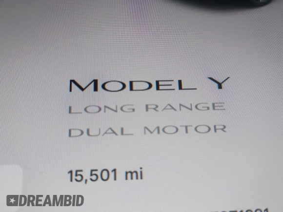 2023 Tesla Model Y Long Range with VIN 7SAYGAEE4PF871281, listed as a IAAI auction lot 41989805 with 15,501 mi miles. Bid and sale history available at carsss.com. Image 16.