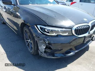 2019 BMW 3 Series 330i xDrive with VIN WBA5R7C5XKAJ78505, listed as a IAAI auction lot 41955059 with 53,216 mi miles. Bid and sale history available at carsss.com. Image 6.