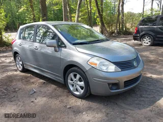 2010 Nissan Versa 1.8 SL with VIN 3N1BC1CP5AL357518, listed as a IAAI auction lot 42090152 with 149,821 mi miles. Bid and sale history available at carsss.com. Image 1.