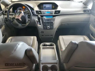 2012 Honda Odyssey Touring with VIN 5FNRL5H98CB028309, listed as a Copart auction lot 57663485 with 233,921 mi miles and Salvage title. Bid and sale history available at DreamBid. Image 8.