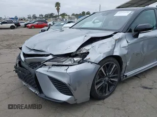 2020 Toyota Camry XSE with VIN 4T1K61AK1LU318098, listed as a IAAI auction lot 42197271 with 64,118 mi miles and . Bid and sale history available at DreamBid. Image 6.