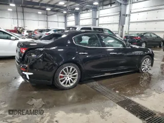 2017 Maserati Ghibli S Q4 z VIN ZAM57RTA0H1196498, wystawiony jako Copart lot #79911364 z przebiegiem 69 950 mil mil oraz Szkody całkowita. Historia ofert i sprzedaży dostępna na DreamBid. Obrazek 3.