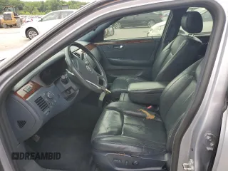 2006 Cadillac DTS 1SC z VIN 1G6KD57Y36U186630, wystawiony jako Copart lot #60792235 z przebiegiem 137 670 mil mil oraz Czysty tytuł • Clean title. Historia ofert i sprzedaży dostępna na DreamBid. Obrazek 7.