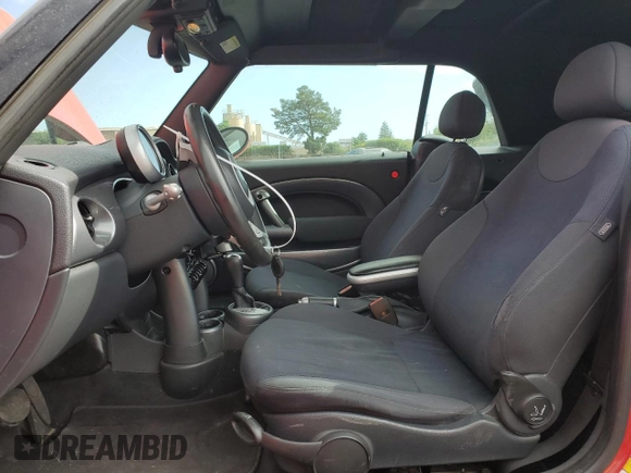 2008 MINI Convertible with VIN WMWRF33558TG18147, listed as a Copart auction lot 53547385 with 131,458 mi miles and Salvage Title. Bid and sale history available at DreamBid. Image 7.